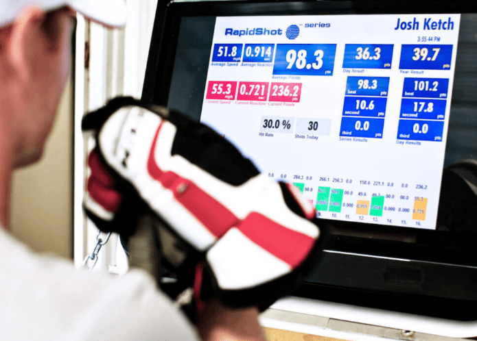 Hockey Player reviewing performance data generated by the RapidShot