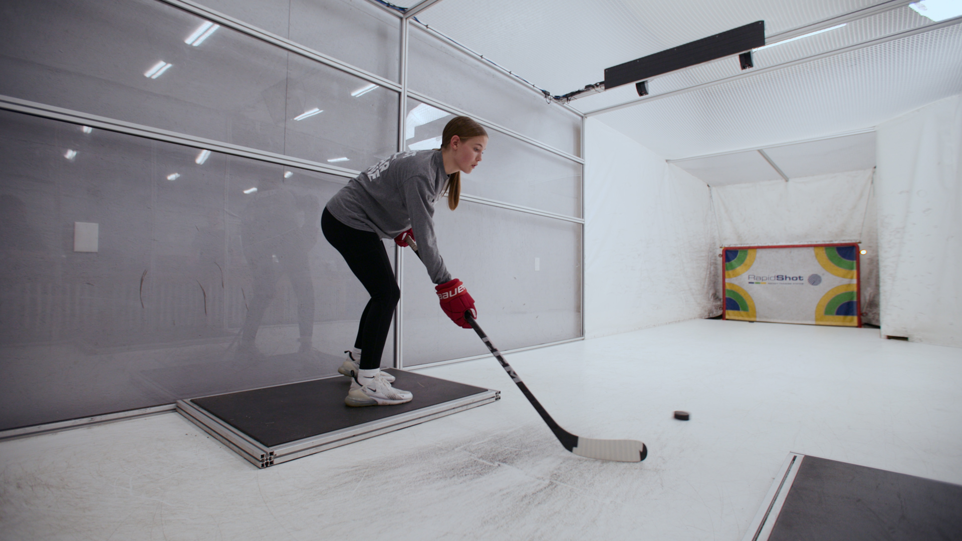 Automatic puck passing and collection system.